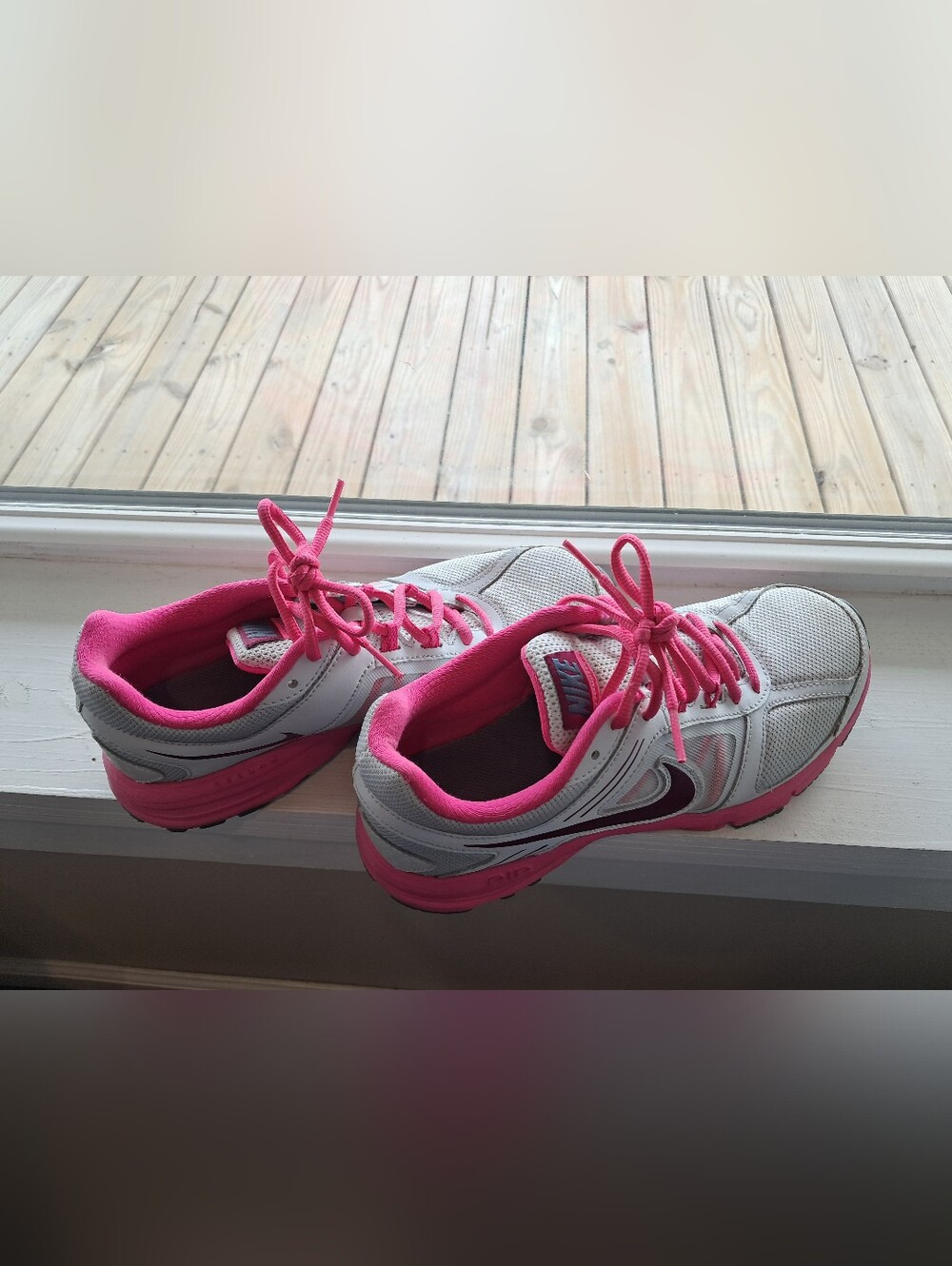 Women's White and Pink Nike Athletic Sneakers